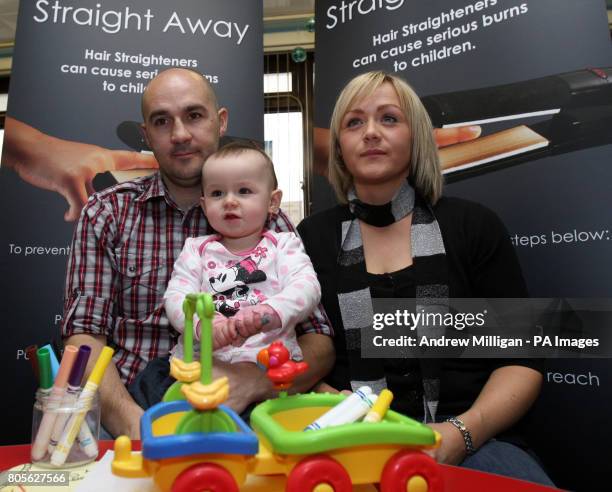 Eighteen-month-old Kayla Murray with her mum Michelle Murray and dad Paul McGee at Glasgow's Royal Hospital for Sick Children as they are backing a...