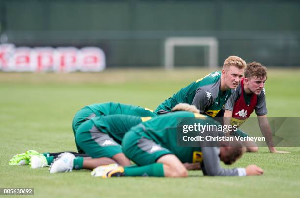 Marvin Schulz and Christoph Kramer during a training session of Borussia Moenchengladbach at Borussia-Park on July 02, 2017 in Moenchengladbach,...