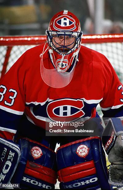 Patrick Roy of the Montreal Canadiens tends goal against the Boston Bruins in game at the Boston Garden.