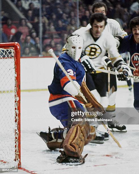 Billy Smith of the New York Islanders makes save in game against the Boston Bruins at the Boston Garden.