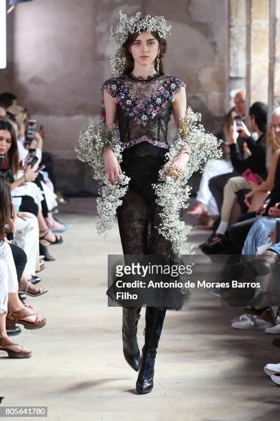 Model walks the runway during the Rodarte Haute Couture Fall/Winter 2017-2018 show as part of Haute Couture Paris Fashion Week on July 2, 2017 in...