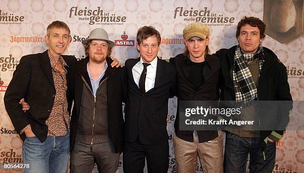 Actors Andreas Schmidt, Oliver Broecker, Maxim Mehmet, Jona Mues and Martin Brauer attend the premiere of the film 'Fleisch Ist Mein Gemuese' at the...