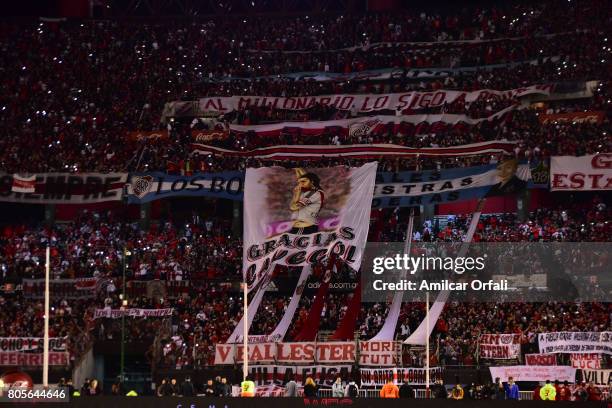Fans of River Plate display banners during Fernando Cavenaghi's farewell match at Monumental Stadium on July 01, 2017 in Buenos Aires, Argentina.