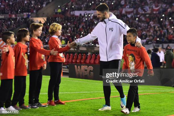 Augusto Batalla goalkeeper of River Plate walks onto the field prior Fernando Cavenaghi's farewell match at Monumental Stadium on July 01, 2017 in...