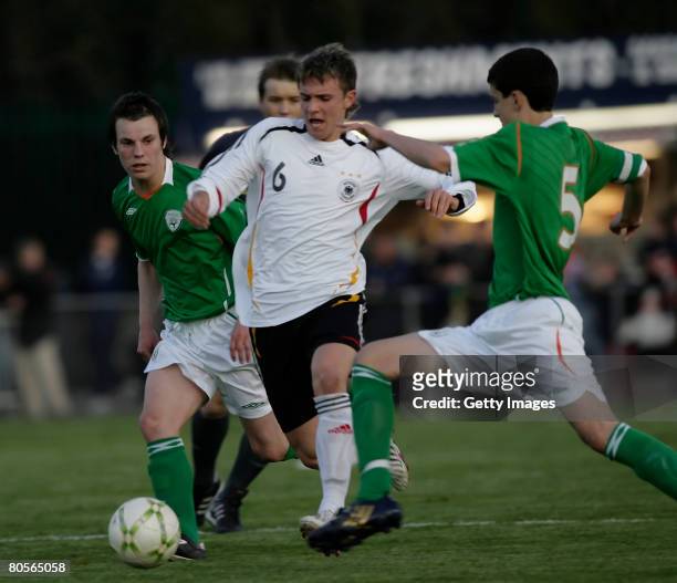 Ireland's Sean Skelly & Anthony O'Connor and Germany's Sebastien Dreier during the U16 International friendly, Ireland vs Germany at O'Shea Park on...