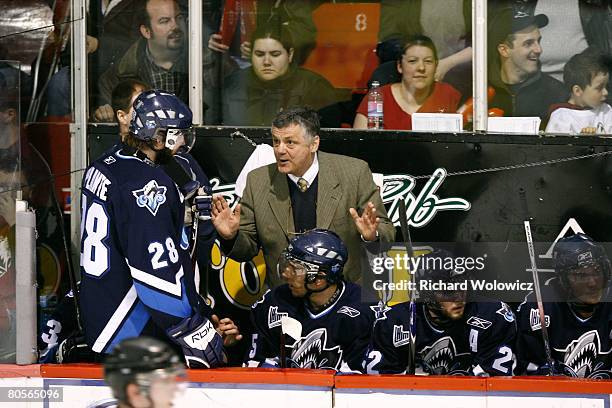 Rimouski Oceanic head coach Clement Jodoin talks to Dave Plante during the game against the Rouyn-Noranda Huskies at Dave Keon Arena on April 05,...