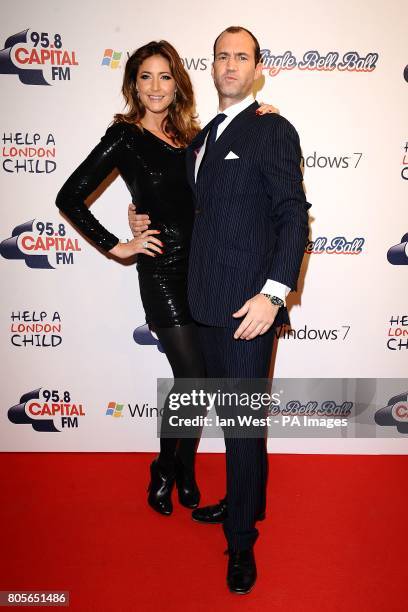 Johnny Vaughan and Lisa Snowdon in the press room of Capital FM's Jingle Bell Ball at the O2 Arena in London.