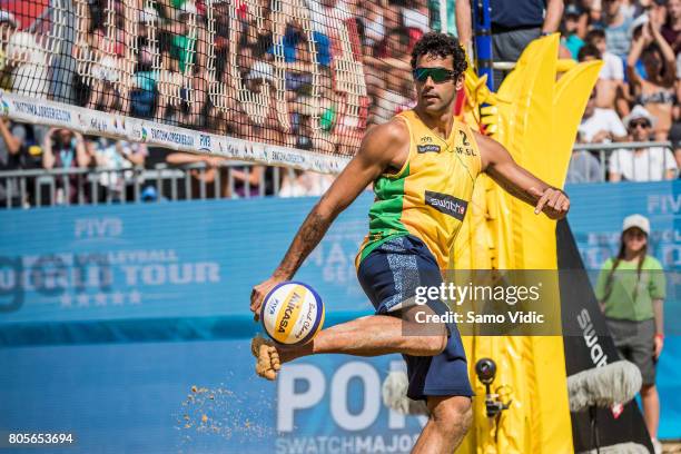 Gustavo Carvalhaesv of Brazil kicks the ball during gold medal match against Daniele Lupo and Paolo Nicolai of Italy during the second stage of the...