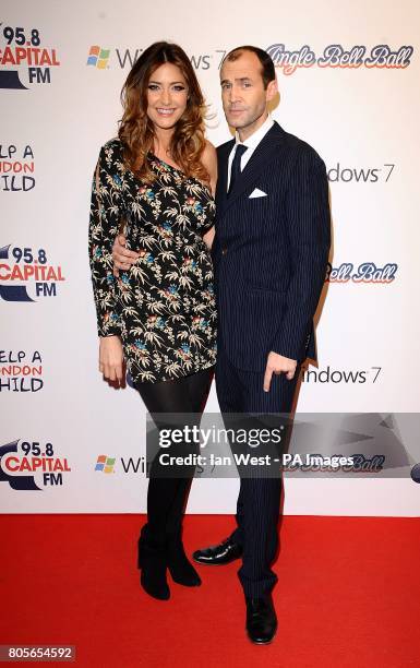 Johnny Vaughn and Lisa Snowdon in the press room of Capital FM's Jingle Bell Ball at the O2 Arena in London.