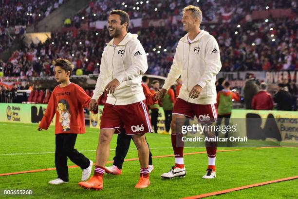 Rugby player of Argentina Martin Landajo and head coach of Argentina Davis cup Daniel Orsanic enter to the field prior Fernando Cavenaghi's farewell...
