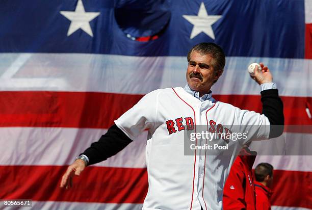 Former Boston Red Sox player Bill Buckner throws out the ceremonial first pitch at the MLB baseball game between the Boston Red Sox and Detroit...