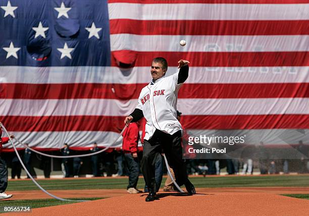 Former Boston Red Sox Bill Buckner throws the ceremonial first pitch before the team's season home opener against the Detroit Tigers on April 8, 2008...