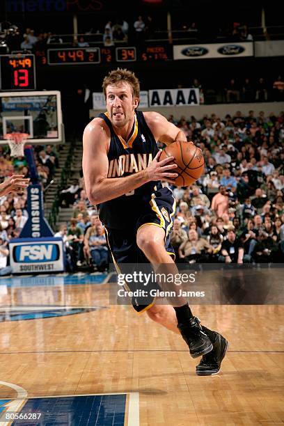 Troy Murphy of the Indiana Pacers drives to the basket during the game against the Dallas Mavericks on March 14, 2008 at American Airlines Center in...