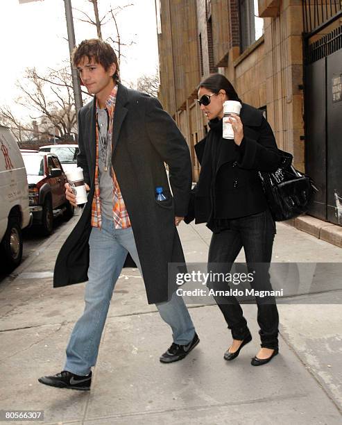 Ashton Kutcher and Demi Moore are seen as they leave a friend's apartment in the Upper West Side April 8, 2008 in New York City.