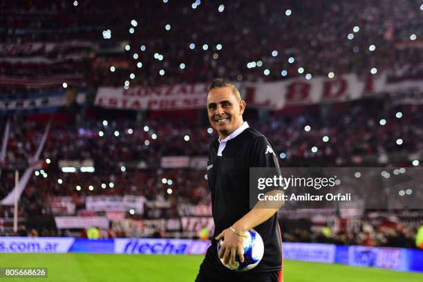 Referee Pablo Lunati walks onto the field prior Fernando Cavenaghi's farewell match at Monumental Stadium on July 01, 2017 in Buenos Aires, Argentina.