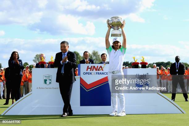Tommy Fleetwood of England celebrates victory following day four of the HNA Open de France at Le Golf National on July 2, 2017 in Paris, France.