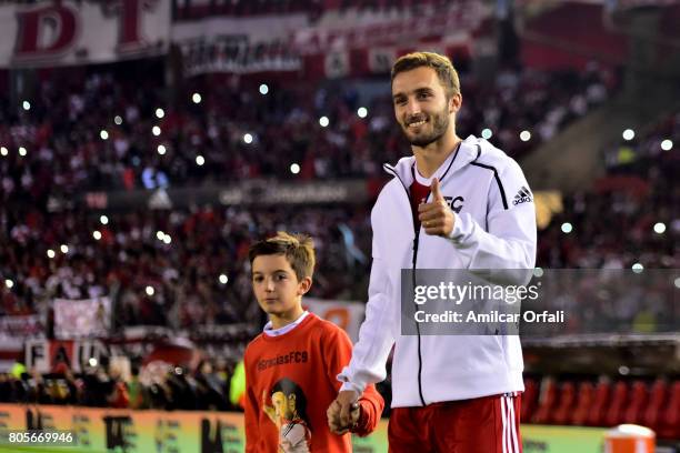 Former player of River Plate German Pezzella walks onto the field prior Fernando Cavenaghi's farewell match at Monumental Stadium on July 01, 2017 in...