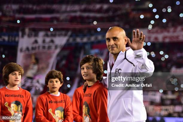 Former soccer player Cristian Ledesma walks onto the field prior Fernando Cavenaghi's farewell match at Monumental Stadium on July 01, 2017 in Buenos...