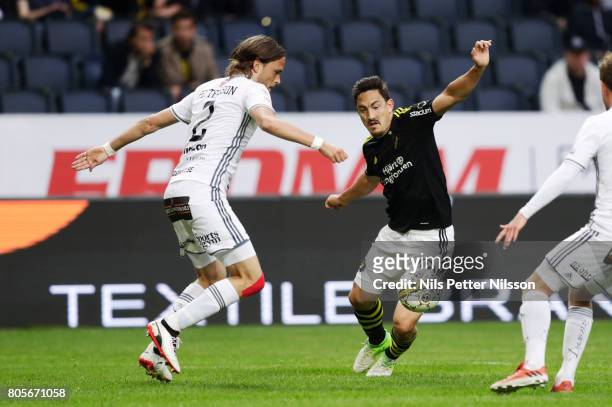 Tom Pettersson of Ostersunds FK and Stefan Ishizaki of AIK competes for the ball during the Allsvenskan match between AIK and Ostersunds FK at...