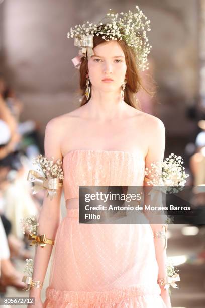 Model walks the runway during the Rodarte Haute Couture Fall/Winter 2017-2018 show as part of Haute Couture Paris Fashion Week on July 2, 2017 in...