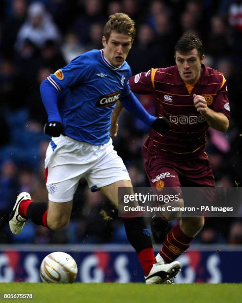 Rangers' Steven Davis and Motherwell's Robert McHugh during the Clydesdale Bank Scottish Premier League match at Ibrox, Glasgow.