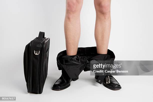 a businessman caught with his pants down - trousers down stock pictures, royalty-free photos & images