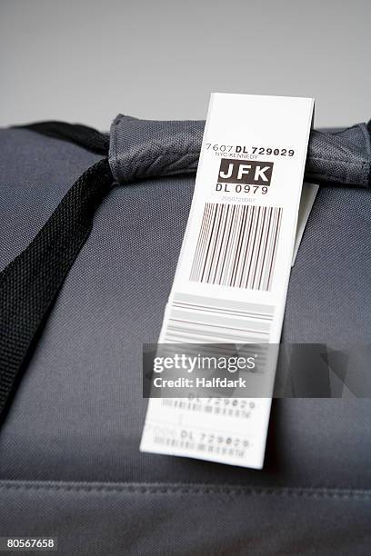 a luggage tag on a bag - bagagelapp bildbanksfoton och bilder