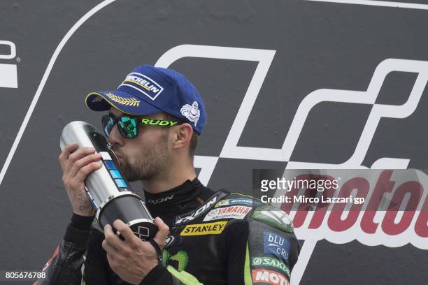 Jonas Folger of Germany and Monster Yamaha Tech 3 celebrates the second place on the podium at the end of the MotoGP race during the MotoGp of...