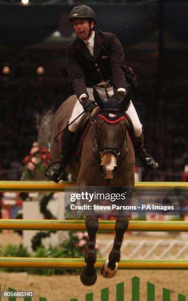 Holland's Eric van der Vleuten riding VDL Groep Tomboy competes in the Rolex FEI Worldcup during the London International Horse Show at the Olympia...