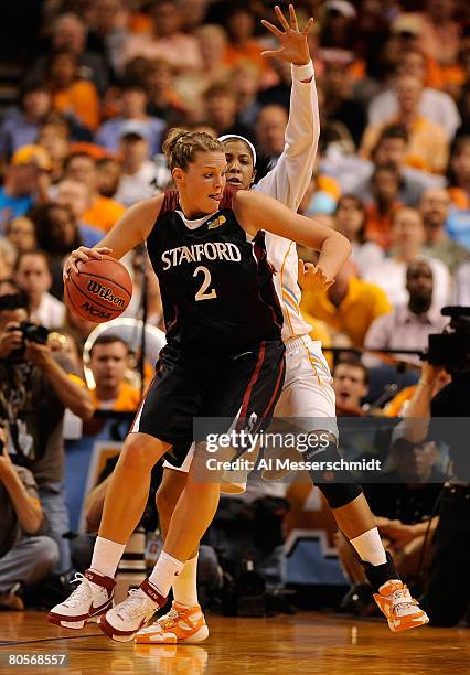 Jayne Appel of the Stanford Cardinal posts up against Candace Parker of the Tennessee Lady Volunteers during the National Championsip Game of the...