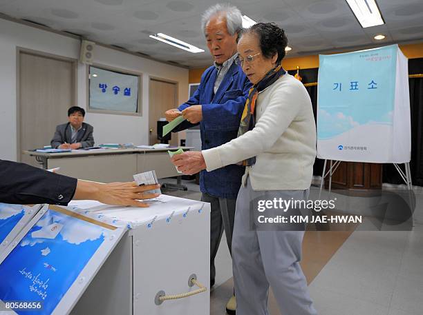 South Koreans casts their ballot in the country's general elections in Seoul on April 9, 2008. South Koreans went to the polls to elect a new...