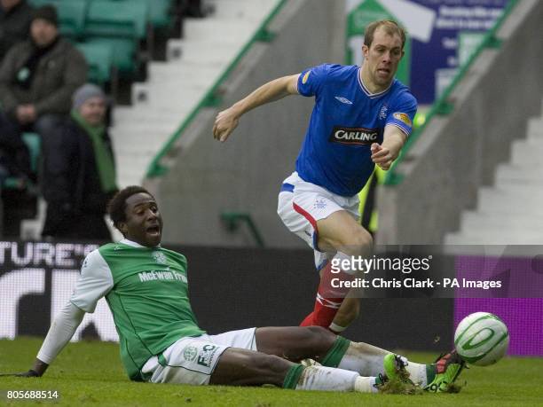 Hibernian's Souleymane Bamba and Rangers' Steven Whittaker battle for the ball during the Clydesdale Bank Scottish Premier League match at Easter...
