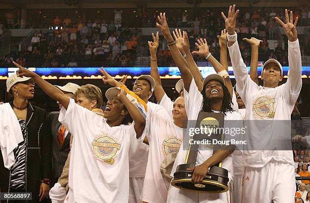 The Tennessee Lady Volunteers celebrate with the trophy after their 64-48 win against the Stanford Cardinal during the National Championsip Game of...