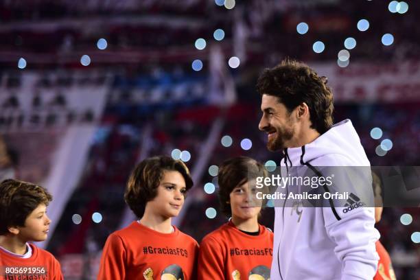 Former soccer player Pablo Aimar walks onto the field prior Fernando Cavenaghi's farewell match at Monumental Stadium on July 01, 2017 in Buenos...