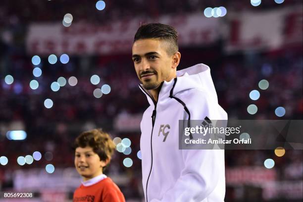 Former player of River Plater Manuel Lanzini walks onto the field prior Fernando Cavenaghi's farewell match at Monumental Stadium on July 01, 2017 in...