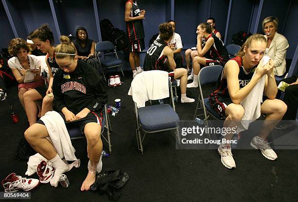 Players from the Stanford Cardinal sit in the locker room dejected after they lost 64-48 against the Tennessee Lady Volunteers during the National...