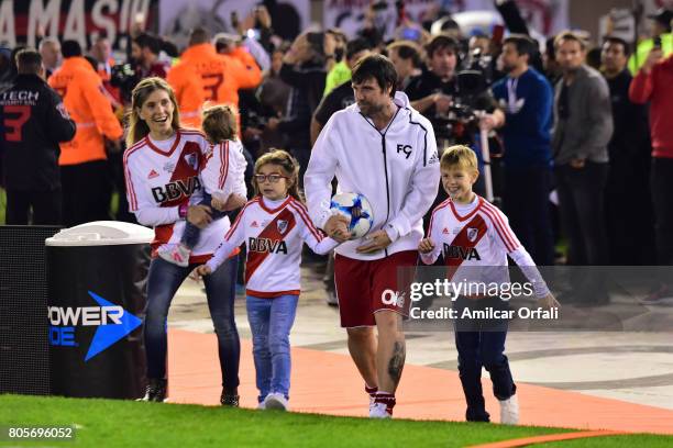 Fernando Cavenaghi walks onto the field with his wife Soledad Gaynor and his sons Benjamín, Sophie and Anna during Fernando Cavenaghi's farewell...