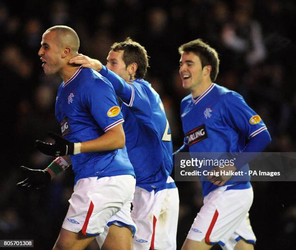 Rangers' Madjid Bougherra celebrates scoring his sides seventh goal during the Clydesdale Bank Scottish Premier League match at Ibrox, Glasgow.