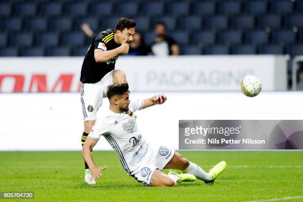 Stefan Ishizaki of AIK and Sotirios Papagiannopoulus of Ostersunds FK competes for the ball during the Allsvenskan match between AIK and Ostersunds...