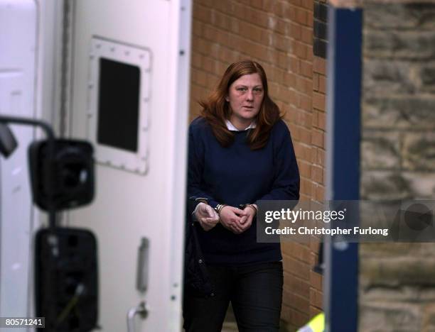 Handcuffed Karen Matthews, the mother of Shannon Matthews leaves Dewsbury Police Station today to appear at court charged with perverting the course...