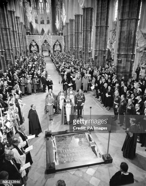 Scene in Westminster Abbey after the unveiling by the Queen of the commemorative table to Sir Winston Churchill. The Queen and the Duke of Edinburgh...