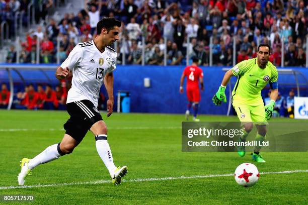 Lars Stindl of Germany scores the opening goal as Claudio Bravo of Chile looks on during the FIFA Confederations Cup Russia 2017 Final match between...