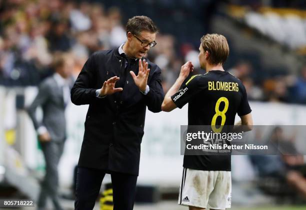 Rikard Norling, head coach of AIK in discussion with Johan Blomberg of AIK during the Allsvenskan match between AIK and Ostersunds FK at Friends...