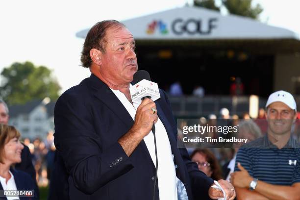 Broadcaster Chris Berman of ESPN speaks during the trophy presentation after Jordan Spieth of the United States won the Travelers Championship in a...