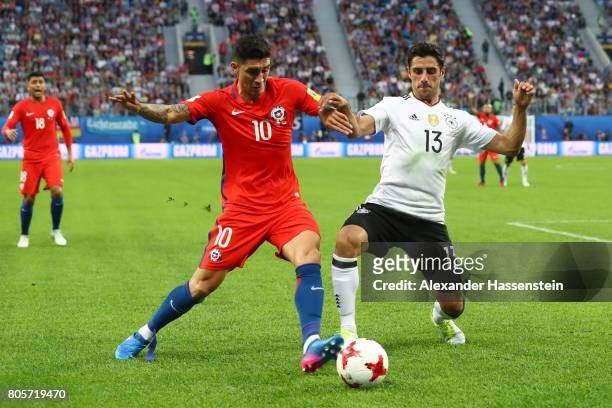 Pablo Hernandez of Chile and Lars Stindl of Germany battle for possession during the FIFA Confederations Cup Russia 2017 Final between Chile and...