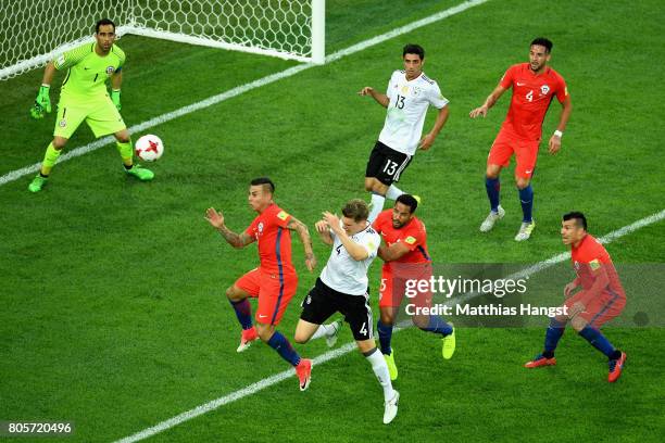 Eduardo Vargas of Chile, Matthias Ginter of Germany and Jean Beausejour of Chile attempt to win a header during the FIFA Confederations Cup Russia...