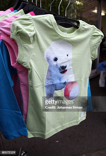 Shirts, depicting Flocke, the three-month old polar bear cub, are displayed in front of a zoo shop at the Nuremberg Zoo on April 8, 2008 in...