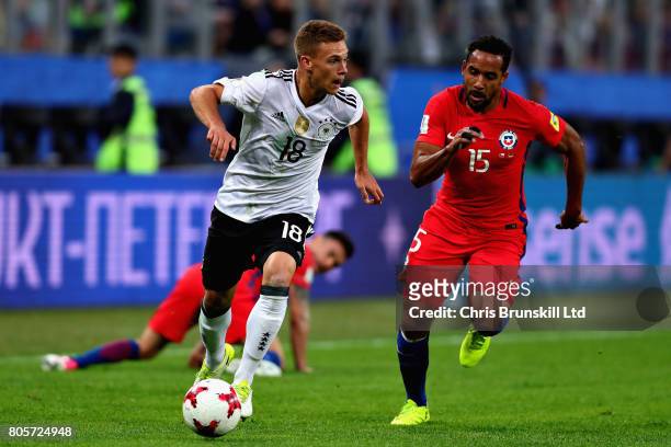 Joshua Kimmich of Germany runs past Jean Beausejour of Chile during the FIFA Confederations Cup Russia 2017 Final match between Chile and Germany at...