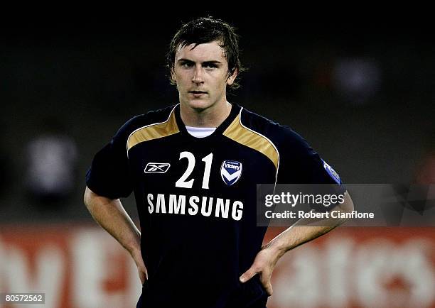 Sebastian Ryall of the Victory leaves the ground dejected after the AFC Champions League Group G match between the Melbourne Victory and Gamba Osaka...