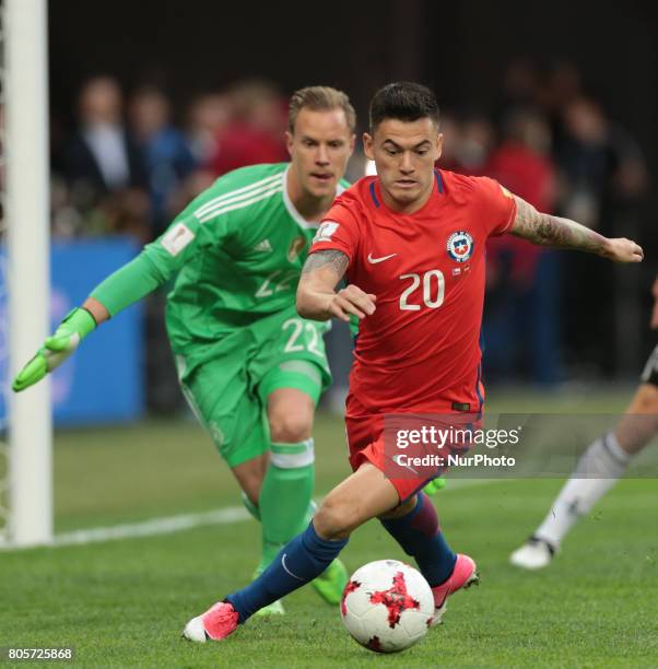 Marc-Andre Ter Stegen of the Germany national football team and Charles Aranguiz of the Chile national football team vie for the ball during the 2017...